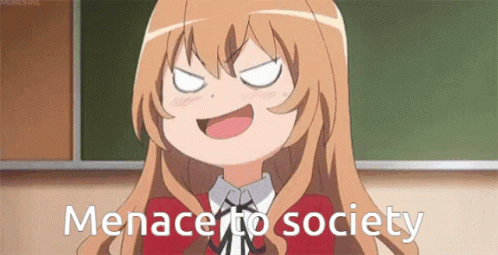 Toradora laughing with the caption &#x27;menace to society&#x27;